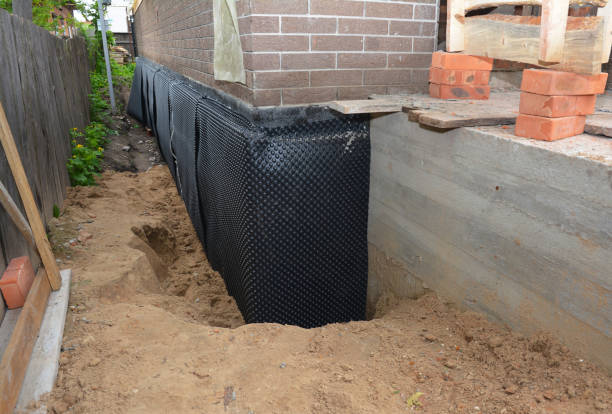 Happy homeowners after waterproofing job in Milmay